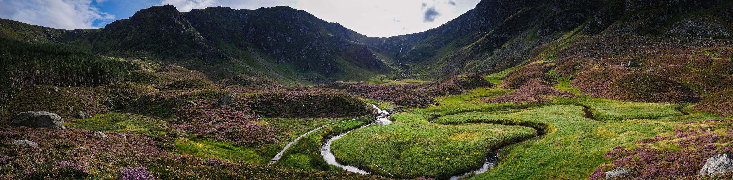 Panoramic view of spectacular Corrie Fee in Glen Clova in the Angus Glens region in western Scotland