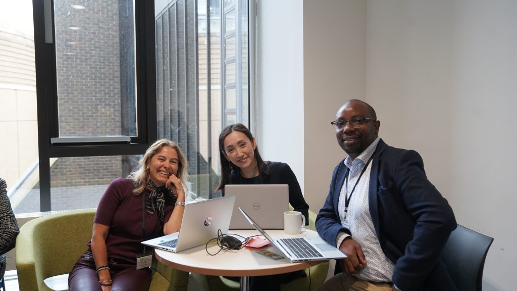 Yuko Kurauchi (centre) poses for a group picture with BES-Net partners, Juanita Chaves (left) from UNEP-WCMC and Joseph Karanja (right) from UNESCO. Photo by the NEA Initiative  